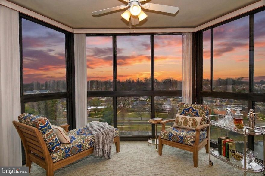 Resort Living Meets Unbeatable Value! Step into the lifestyle you have earned with this beautifully designed, move-in-ready two-bedroom, two-bathroom condominium in Leisure World, a highly sought-after, gated 55+ community. Priced impeccably under $200,000, this residence combines carefree, low-maintenance living with unparalleled access to a vibrant, resort-style world.

Perched on the 10th floor of a well-managed, secure elevator building, your new home welcomes you with a beautifully remodeled lobby and boutique-style hallways. A welcoming foyer opens into a spacious, open-concept living and dining room  painted in a  neutral palette that serves as a serene backdrop for relaxing or entertaining. Natural light pours into the home from the true focal point of the home - the expansive enclosed sunroom balcony. This versatile, year-round retreat offers sweeping panoramic views of the signature community fountain, the beautifully changing leaves of the surrounding mature trees, and sunsets that create those magical moments.

Designed for maximum comfort and privacy, the home features a highly desirable dual-primary layout, with the bedrooms thoughtfully positioned on opposite sides of the living space. The primary suite is a true private oasis, boasting a dual-entry walk-in closet, a dedicated built-in vanity, and a full en-suite bath. The generously sized second bedroom mirrors this comfort with its own private en-suite bath, making it a perfect space for visiting guests or a quiet home office. Everyday tasks are a breeze with convenient in-unit laundry, while an additional storage unit that conveys with the sale and abundant parking easily accommodate all your practical needs.

Beyond the walls of this pristine condo, a breathtaking array of amenities awaits. Your modest condo fee—which includes water and basic cable—unlocks a world of fitness, fun, and leisure. The community boasts two spectacular clubhouses, indoor and outdoor pools, a state-of-the-art fitness center, and active tennis and pickleball courts. Cultivate your hobbies in the woodworking, ceramic, and art studios, enjoy a film in the private theater, or cap off your day with dinner and drinks at the on-site restaurants and lounge. 

Whether you are a full-time resident or seeking a “lock-and-leave” seasonal home, you will enjoy 24/7 gated security and ultimate peace of mind. With the MedStar Medical Center, shopping, salons, on-site transportation, and a post office right on the grounds, every convenience is quite literally at your doorstep. Don’t miss your chance to claim this rare opportunity!