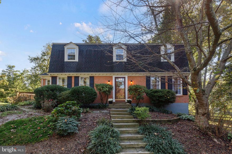 Nestled within the coveted Springdale community, this five-bedroom, two full bathroom, two half bathroom home presents an exquisite blend of modern comfort and timeless charm. As you step inside, you'll be welcomed by gleaming hardwood floors, elegant crown molding, and an abundance of natural light. The separate dining area is adorned with a unique pendant light, and the gourmet kitchen, with its pendant lighting, quartz countertops, bright white subway tile backsplash, and stainless steel appliances, seamlessly flows into the open-concept living room, graced by a brick, wood-burning fireplace. Enjoy easy access to the patio for indoor-outdoor living. The main level also offers a convenient mudroom and a half bath. Upstairs, you'll find four generously-sized bedrooms, including a primary suite that boasts a customized bathroom with his and hers sinks, recessed lighting, a walk-in shower with mosaic tile, and a stylish glass door. The fully finished basement provides additional space, complete with a half bath and ample storage. Outside, the fenced backyard creates a serene oasis, offering splendid views of the surrounding trees and greenery, while the large deck provides the perfect setting for entertaining. This is a truly exceptional family home - come experience it for yourself and make it yours today!