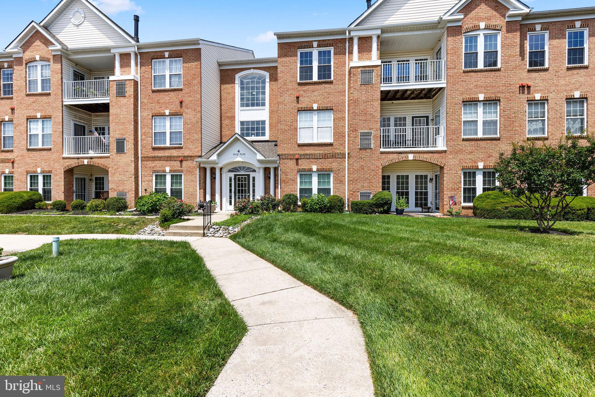 Welcome to Devonshire II at White Marsh—this top-floor penthouse condo offers 1,634 sq ft of comfortable, low-maintenance living in a secure, elevator-equipped building. The single-level layout features two spacious bedrooms, two full bathrooms, and a bright open-concept living area. You'll appreciate the convenience of in-unit laundry, generous closet space throughout, and an assigned parking space. For added peace of mind, a leased video-only ADT alarm system is already in place. Ideally located in the Devonshire II community at White Marsh, this home is perfect for those seeking ease, space, and secure living.