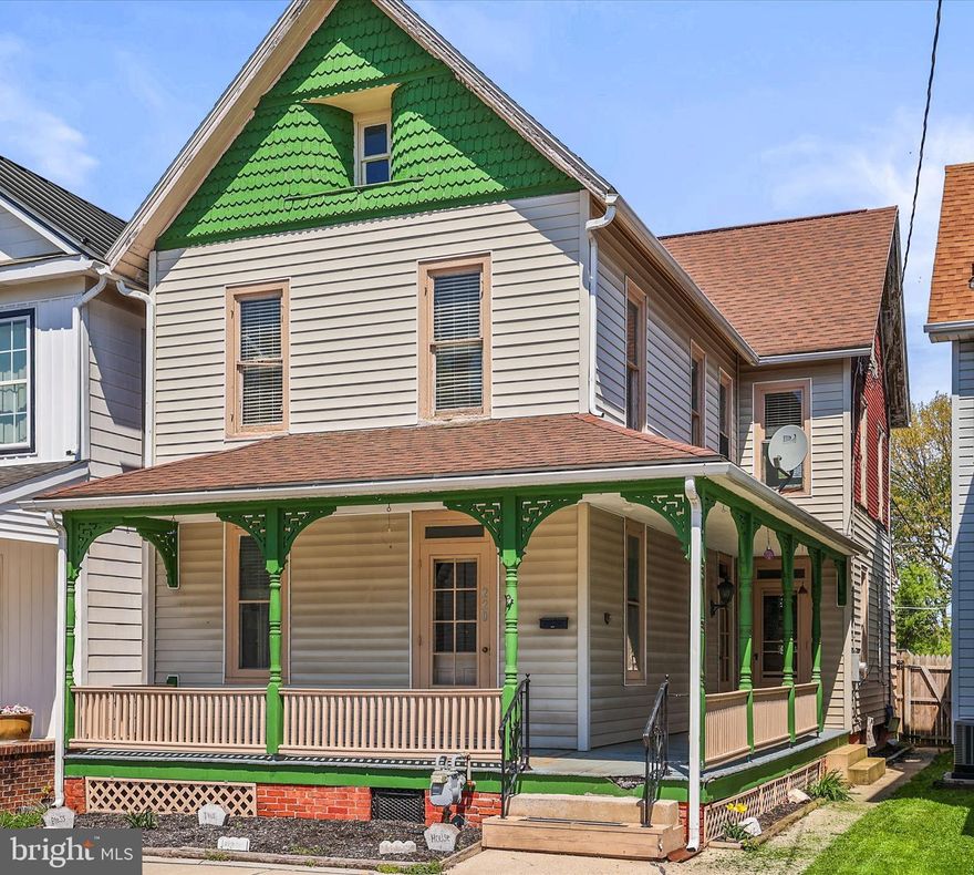 Welcome to 220 Locust Street!  As you walk up the front steps, the wrap around porch will welcome you with a timeless hello.  As you enter through the front door into the large living room, the beautiful old wood, sliding pocket doors will catch your eye.  From the living room, you can choose what the next room will be - a formal dining room, a family room, or a bonus room?  From that room, you can either go up the stairs to the second floor, or you can travel to the kitchen which has new flooring and plenty of space for a large kitchen table.  Off of the kitchen is a full bathroom, and the back door to a covered porch and the backyard.  The backyard is almost completely fenced and there is a 1-car garage with other space available for off-street parking.
The second floor has 4 large bedrooms and a full bath.  Two of the bedrooms are "walk-through" bedrooms.  The third floor has a partially finished room and an attic for storage.