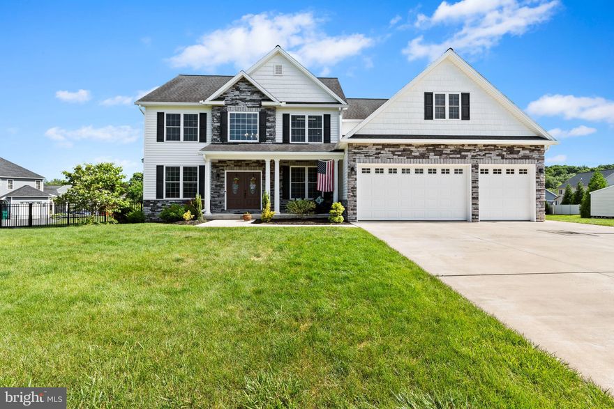 Nestled within the prestigious Hawks Landing community and the coveted Cumberland Valley school district, this captivating residence awaits, you will be wowed from the moment you step through its stately double doors. The grand family room beckons with high ceilings, an abundance of natural light streaming through expansive windows, and a beautiful stone fireplace. A secluded office space provides privacy on the main level. The kitchen is a chef's delight, boasting stainless steel appliances, ample cabinet storage, generous countertop space for meal preparation, and a cozy eat-in dining area complemented by built-in seating. Retreat upstairs to a haven of relaxation in the primary suite, featuring a luxurious spa-like ensuite bathroom with a standing shower, soaking tub, and dual sinks for added convenience. Three additional bedrooms and a full bath round up the second floor. The basement presents endless possibilities for entertainment, boasting a sleek bar area and a cinema room that promises unforgettable gatherings with friends and loved ones. The backyard oasis is ideal for the entertainer with an in-ground saltwater pool, inviting firepit and a covered deck. All this while being conveniently located near shopping, dining and major highways. Don't miss out on calling this your NextHome!