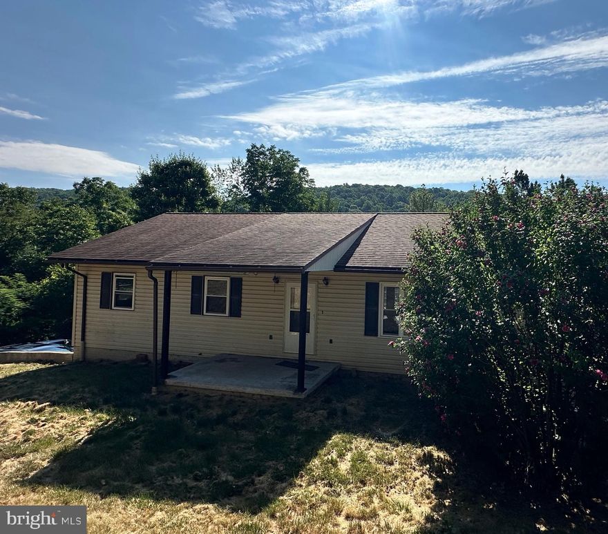 Welcome to Slippery Lane, a hidden gem off Valley Road. This 3 bedroom, 2 bathroom home was built in 1994. It has central air (2017), replacement windows (2021),  a 2 car garage, updated plank flooring in kitchen, bathroom and basement (2020), and stainless steel appliances. The asphalt shingle roof is approx 10 years old.  There is a pellet stove in the fully finished basement.  The home sits on .7 acres, has a fire pit, a swing set and a beautiful view from the back deck.  The basement and deck French doors were installed in 2021 and there is hookup for a hot tub.