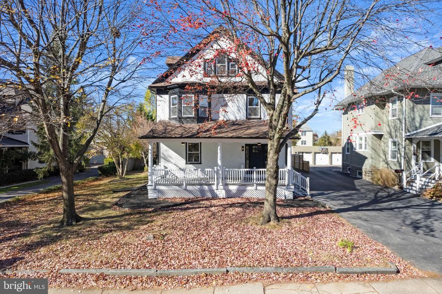 Experience the timeless character of this impeccably reimagined Ardmore residence within a tranquil, tree-lined neighborhood! Exuding captivating curb appeal, the 1905-built abode welcomes you with an inviting covered porch that transitions to a 2,906 sq ft beautifully modernized interior. A fusion of high ceilings, recessed lighting, crisp white tones, and gorgeous wide-plank flooring is complemented by exquisite vintage touches, such as artisan stained glass windows and intricate staircase rail details. Brilliant sunlight spills through large windows, creating a bright, vibrant atmosphere across the open-concept main gathering areas. Sure to delight the avid cook, the well-designed kitchen features top-notch stainless steel appliances, sleek cabinetry, quartz backsplash and countertops, and a multi-seater, waterfall island. Retire to the comfortable proportions of the upper-level bedrooms, all graced with ample storage and plush carpeting. Two stylishly tiled shared baths cater to the secondary quarters on each floor. Outshining them all, the primary suite is a sanctuary all its own with a ceiling fan, a walk-in closet, and a luxurious ensuite with dual vanities and an oversized frameless shower. Outside, a sprawling backyard beckons you to hold weekend celebrations in seclusion. Additional features include a laundry room and a generous, versatile basement. With local shopping, dining, schools, transportation, and entertainment all easily accessible, why wait? Schedule a tour today to see it for yourself!