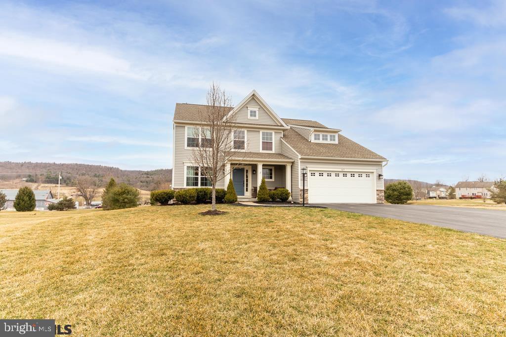 Beautifully appointed 2-story on an acre lot in Trotter Farms. One never tires of the panoramic views, stunning sunsets nestled into this country setting only 10 minutes from Wegmans! Pleasing color palette with dark hardwood floors on entire first floor, graced with a timeless white kitchen, farmers sink and stainless-steel appliances with a double oven. Sliding glass doors to a composite deck with walk out basement below boast additional outdoor entertaining opportunities. Stay organized and clutter free when entering the home with this massive mud room. Open concept allows for flexible living space options.  Owners' suite delivers high end amenities, 2nd floor laundry with three additional bedrooms and full bath. Newly finished walk out lower level with full bath allows a host of space options.  The Buyer is responsible for paying Halfmoon Township water hook up fees. The water assessment of the unit is $415 payable quarterly to Paradigm Properties.