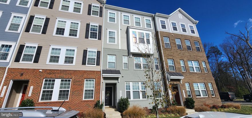 This like-new (only 2 years old) 2-bedroom townhouse-style condo offers the perfect blend of modern design and functionality. As an end-unit, it boasts an open floor plan on the main level, featuring a spacious gourmet kitchen with quartz countertops and stainless-steel appliances. High ceilings and large windows flood the space with natural light, creating an airy, inviting atmosphere.

Upstairs, you'll find a luxurious primary bedroom with a walk-in closet and a spa-inspired bathroom complete with a private water closet and a shower. The secondary bedroom provides ample space, and a bonus den with access to a rear deck adds versatility.

Conveniently located for commuters and within walking distance of two grocery stores, this home is nestled in the sought-after Glenn Dale Condos community. Enjoy community amenities such as a pavilion, dog park, playground, walking trail, and a charming butterfly garden.