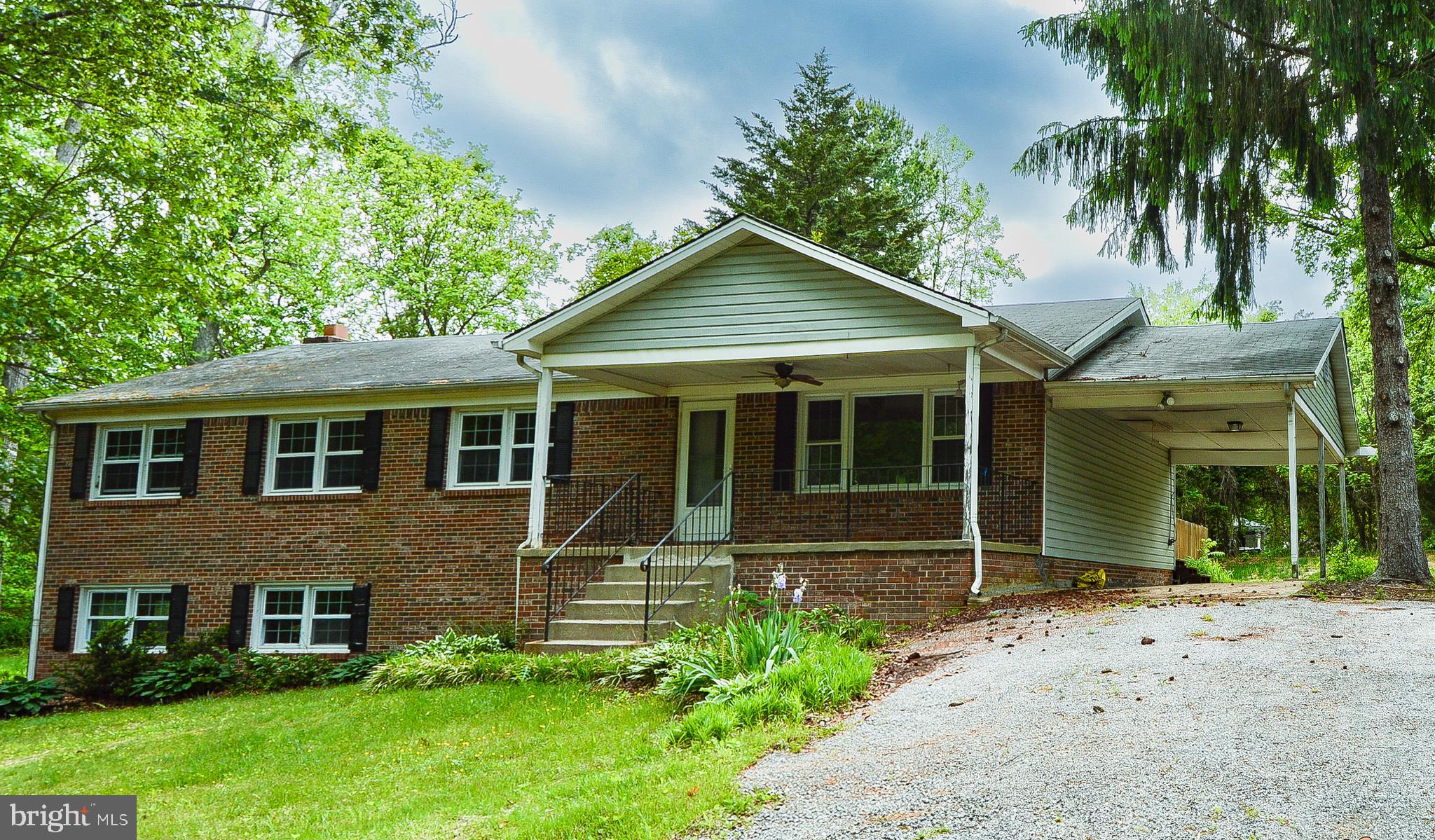 Owings, Maryland , Just west of Cheasapeake Beach and 15 minutes south of Upper Marlboro , This Brick Rancher is located on a quiet quiect cul-de-sac and sited on more than a 1/2 acre . Features include hardwood floors in the living room /dining room area. Sliding glass doors to an enormous (almost 700 sq. ft. ) deck overlooking the rear yard. Primary suite with private bath and walk in closet. The lower level offers tall ceilings with brick fireplace and level walkout. There is a 3rd bathroom plus several extra built out rooms. This property is well lived in and is in need of some new vision and lots of TLC .