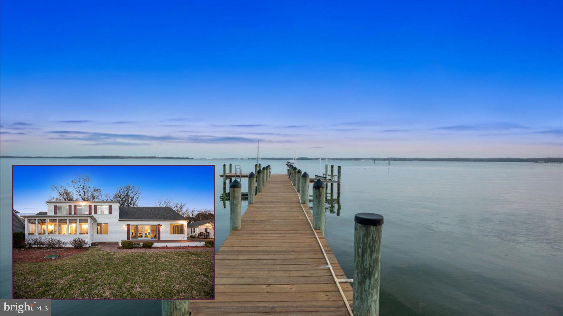 Discover Your Dream Waterfront Home in Southern Maryland! This stunning waterfront property offers unparalleled Patuxent River and Solomons Harbor views, perfect for those seeking a tranquil escape or an active waterfront lifestyle. Wake up to breathtaking sunrises and unwind with spectacular sunsets over the water. This exceptional waterfront retreat boasts a private pier with a boat lift, providing direct deep-water access for fishing, crabbing, and boating adventures. Imagine easy access to the Chesapeake Bay right from your backyard! Inside, you'll find a bright sunroom overlooking the water, ideal for quiet mornings. The home features two spacious living areas, one with impressive vaulted ceilings and an upper walkway, offering versatile entertaining spaces. The flexible second level includes a full bathroom and can serve as a third bedroom or a multi-purpose bonus room. An existing detached building with a wet bar offers incredible potential for a guest suite, home office, or studio conversion, adding significant value and living space. Recent updates include a newer roof and furnace, ensuring peace of mind. With ample parking and an ideal open layout for entertaining, this waterfront gem is truly a rare find. Don't miss this opportunity to own your slice of paradise on the Patuxent River!