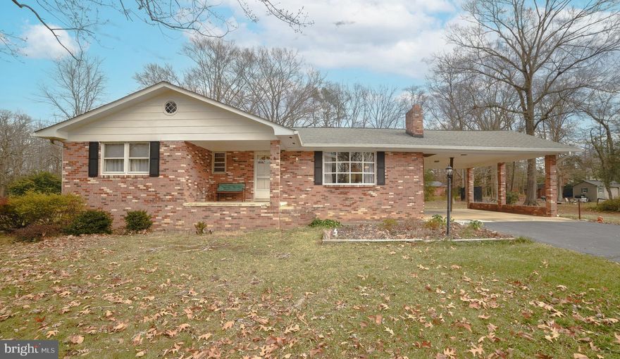 CHECK OUT THIS RAMBLER WITH BASEMENT!!! GREAT FOR EASY ACCESS TO ROUTE 210!!! NO HOMEOWNERS ASSOCIATION - WALKING DISTANCE TO RUTH B. SWANN PARK, PLAYGROUND, WALKING TRAILS AND POTOMAC BRANCH LIBRARY!!!  WONDERFUL SETTING!!! PRIMARY BEDROOM WITH FULL BATH, HARDWOOD FLOORING THRUOUT, COZY FIREPLACE ON EACH LEVEL!!! BRICK CONSTRUCTION, FRONT AND REAR PORCH TO ENJOY THE OUTDOORS!! 
PLENTY OF SPACE TO ENJOY BOTH INDOORS AND OUTDOORS!!! HUGE STORAGE SHED/BARN.
HUGE KITCHEN WITH SERVING BAR AND BREAKFAST AREA OPEN TO FAMILY ROOM AND GOURMET KITCHEN.  BASEMENT WITH REC. ROOM, MASONARY FIREPLACE AND UNFINISHED AREA FOR LAUNDRY AND STORAGE. REAR EXIT/PARTIAL CRAWL SPACE. WOODSTOVE TO CONVEY