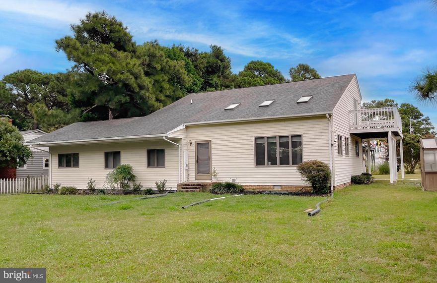 All you need is here! Wonderfully and lovingly updated from the crawl space up! Insulation and sump pump with dehumidifer in crawl space. Main level is now drywall with vaulted ceilings and recessed lighting. Newer cabinets, counters and appliances in the kitchen. Laundry room has the newer HVAC system and washer/dryer with a tankless hot water heater.  2 good sized bed rooms on the main level with full bath. Upper level has the 3rd bedroom with full bath and loft overlooking the great room. Loft area has set up for a wet bar and door to the upper deck. Water view from this area as well as the kitchen. Come and see it and make it your own. Treat yourself!