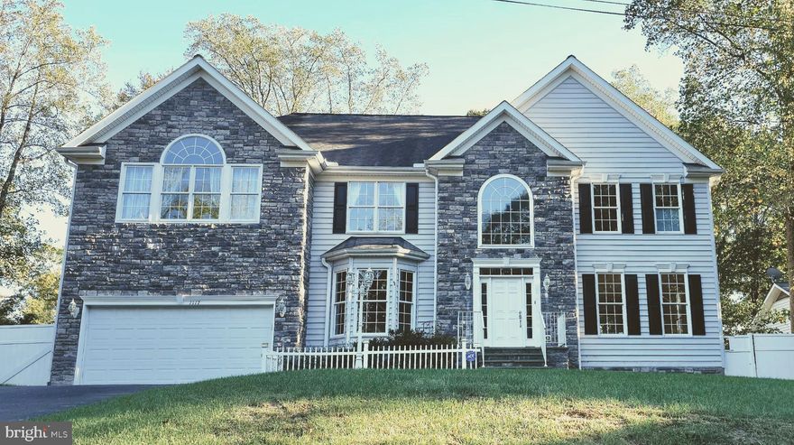 Discover an unparalleled lifestyle in this exquisite Colonial residence nestled within the desirable Aquia Harbour community. This stunning home, boasting 6 spacious bedrooms, and 4.5  bathrooms with over 4600 finished square feet of living space. This residence combines modern amenities with a serene suburban lifestyle. The gourmet kitchen is a chef's dream, featuring upgraded countertops, a generous sized island, and SS appliances.  The open floor plan seamlessly connects the kitchen to the family room, where a cozy stone fireplace serves as the centerpiece, inviting warmth and relaxation. Elegant details such as chair railings, built-ins, and luxurious wood and ceramic tile flooring enhance the home's charm, while the primary suite offers a private oasis with a soaking tub and walk-in shower. The upper level is complete with an inlaw suite with full bath and walk in closet.  The fourth and fifth bedroom share a Jack & Jill styled bathroom.  The fully finished basement, provides additional living space with two generous sized bedrooms, a game room with pool table and kitchenette/ wet bar perfect for entertaining or unwinding after a long day. Outside, the property is equally impressive. The landscaped lot lined with fruit trees featuring a water fountain, a covered porch with electric awnings that invites you to savor the serene surroundings. The attached garage accommodates two vehicles, while the asphalt driveway offers ample off-street parking for guests. Aquica Harbour is not just a community; it's a lifestyle. Residents enjoy exclusive access to a wealth of amenities, including basketball courts, tennis courts, a marina, and scenic walking trails. The gated community ensures privacy and security, allowing you to fully embrace the tranquility of suburban living while remaining close to vibrant recreational opportunities. This property is available for lease starting October 21, 2025, with flexible terms ranging from 12 to 24 months. Experience the luxury and comfort of this exceptional home, where every detail has been thoughtfully curated to elevate your living experience.