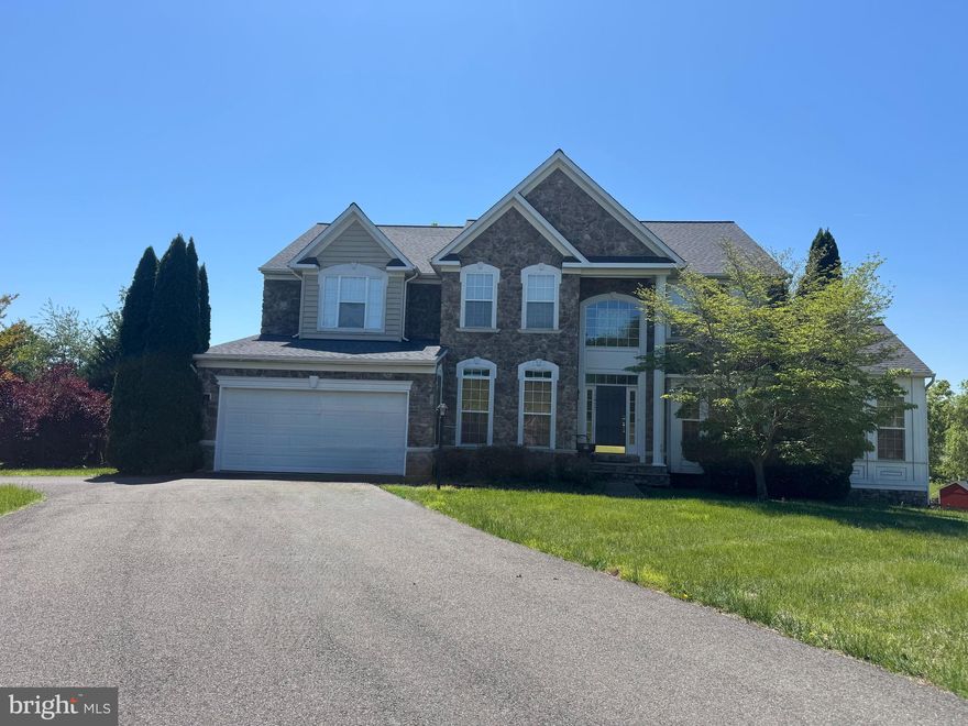 Welcome to this beautiful upscale home located in sought-after Madison Grove in Culpeper County! Situated on nearly an acre at the end of a quiet cul-de-sac, this stunning 5-bedroom, 5 full bath home offers the perfect blend of luxury, space, and functionality.
Step inside to find extensive wood flooring, elegant crown moldings, and spacious light-filled living areas throughout. The gourmet kitchen features granite countertops, stainless steel appliances, and abundant cabinetry — perfect for entertaining and everyday living.
The luxurious primary suite is truly a retreat with its own private sitting area and a beautiful triple-sided fireplace creating warmth and ambiance. A second stone fireplace anchors the inviting family room.
The fully finished walk-out basement offers incredible flexibility with a large rec room, den, home theatre, wet bar, and potential for an in-law suite, guest quarters, or rental income opportunity.
Outdoor living shines with two spacious decks overlooking the large private yard. Additional highlights include a brand new roof, home office, gracious layout, and unbeatable location just minutes from shopping, dining, and Route 29.
Very motivated seller — don’t miss this exceptional opportunity!
PUBLIC OPEN HOUSE and MOVING SALE:
Friday, May 15th | 5:00 PM – 7:00 PM
Saturday, May 16th | 1:00 PM – 3:00 PM