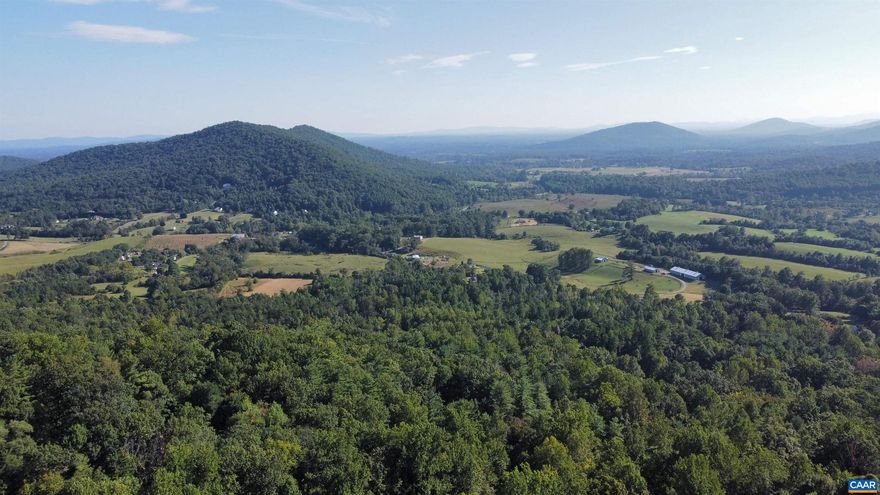 This large lot on Daniels Mountain offers elevated views of the Piedmont foothills and valleys.  Large hardwoods protect privacy and allows for several home sites.   Commune with nature all year long or perfect for that getaway retreat.   Must have an agent accompany viewings.   4x4 vehicles suggested.