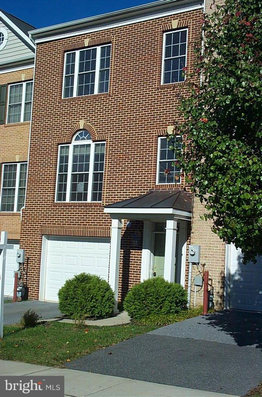 ELEGANT & CONVENIENCE! Brick Front garage TH Gourmet Kitchen w/Granite, Isle w/cooktop & double ovens, breakfast bar, & large table space. Lrge main level LivgRm & DingRm combo, w/vanity bath. Fabulous Master suite w/walk-in closet & luxurious garden bath, sep. shwr.  LvL foyer entrance, hall to FamRm w/full bath, 4th bdrm?. Near Rest, Giant, & Rtes 100, 29, I95, I70.