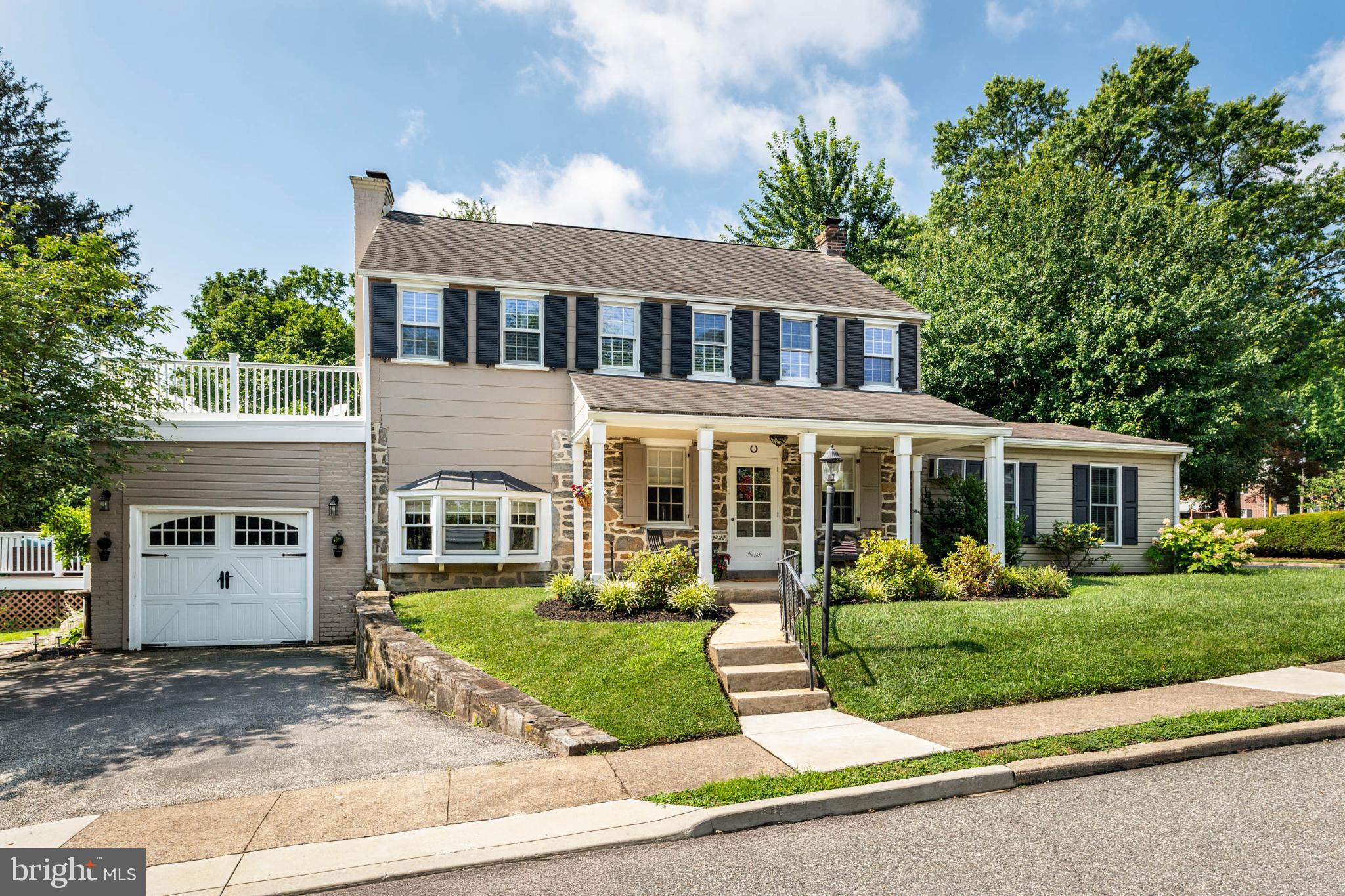 Welcome to 529 Covington Road, a charming colonial home situated on a corner lot in the quiet, tree lined neighborhood of Chatham Village. This property features a welcoming, covered front porch leading into a spacious living room, with recessed lighting, hardwood floors and plenty of natural light. The dining room is great space for hosting gatherings and features a bay window. The refreshed kitchen features two toned cabinetry, updated appliances and hardwood floors. There is a large, maintenance free deck off the kitchen, for grilling and entertaining. Adjacent to the living room is a sucken den/family room with built in shelves and a gas fireplace. While on the other end of the first floor is an in-law suite with full bath, laundry area, kitchenette, private room and outside entrance with zero stair access. This versatile area can be used as a guest suite or as an office, gym space or as a great room; the possibilities are endless. The second floor features a spacious master bedroom with his and her closets and hardwood flooring. There are two more generously sized bedrooms with roomy closets, a hall bath and a deck on this floor. Other attributes include pull down stairs to an attic for storage needs, a garage and driveway, storage shed. This classic home is located within the award winning Havertown Township School District and is near the historic Grange Estate and the popular Grange Park. Meticulously kept, this is the first time this home has ever hit the public market!