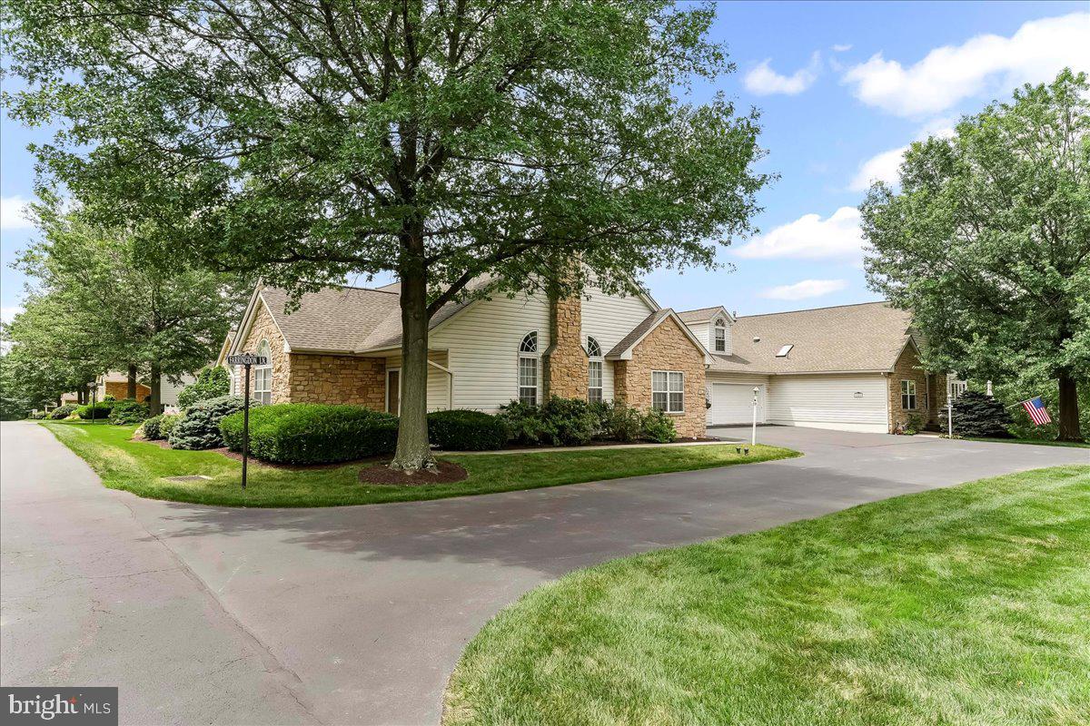 Here’s a great opportunity to own a home in sought after Lions Gate on a premium lot. The location in this active 55+ community is ideal with green space nearby, no busy street noise and guest parking right at your driveway. Steps away from the clubhouse, which was the original farmhouse, you are sure to take advantage of the many amenities offered here. This Dorchester model features an open and airy floor plan with vaulted ceilings and loads of natural light. Step into the foyer and you’ll appreciate the spacious great room with a gas fireplace. This is open to the dining area and kitchen. Meal prep is a breeze as the kitchen is thoughtfully designed, has plenty of counter space and a pantry. The main owner suite has a walk-in closet, dual vanity and step in shower. The second suite is also generously sized and the second full bath has a tub/shower. The second floor is ready for finishing with the electrical work in place and the future bathroom is plumbed. This could be a hobby room, art studio, guest suite, etc. There is convenient first floor laundry. The 2 car garage has workspace and a storage area. PLUS a new roof in 2021! The clubhouse has event space, a library, a large kitchen and inviting outdoor patio. Additionally, there is a lovely heated pool, fitness room, tennis, pickleball and shuffleboard courts, leisurely walking trails with rest spots. The grounds are beautifully maintained, the gazebos have seasonal landscaping, and there is a definite sense of pride in this community. Showings begin at the open house on Saturday 8/2 12-2PM.