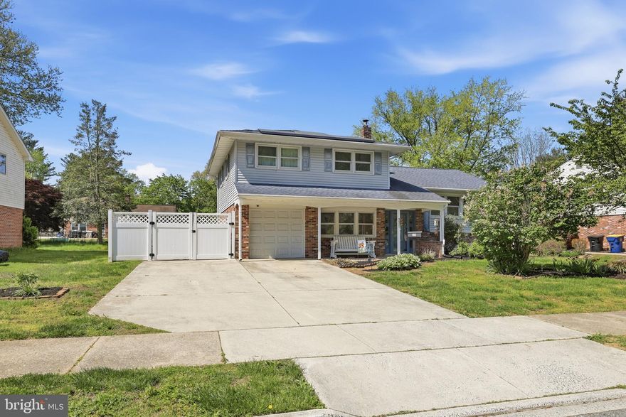 Welcome to this beautifully maintained four-bedroom, two-bath home located in the highly sought-after Caesar Rodney School District, in a quiet and well-established neighborhood. This versatile property features a rare entry-level primary suite complete with a private side entrance and a handicap-accessible walk-in shower—ideal for an in-law suite or anyone seeking convenient first-floor living. The main level offers stunning original hardwood floors, a spacious living and dining area filled with natural light, and an updated kitchen showcasing stylish shiplap, open shelving, and modern finishes. Upstairs, you’ll find three generously sized bedrooms and a full bathroom, providing plenty of space for family or guests. This layout also has real potential to have bedroom access to the bathroom creating an additional primary suite.  Enjoy outdoor living in the fully fenced backyard with a patio and mature landscaping, perfect for relaxing or entertaining. Additional highlights include public water and sewer, newer mini-split systems, a brand-new boiler, central air conditioning, and solar panels that can be transferred or removed at settlement. This home combines comfort, efficiency, and flexibility—don’t miss your opportunity to make it yours.