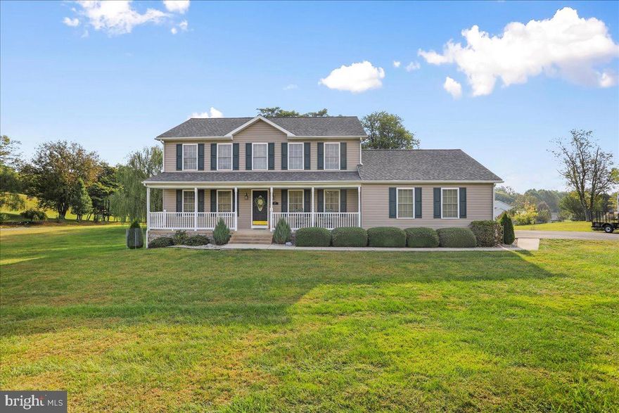 A MUST SEE!! Beautiful 4 bedroom Colonial home on 2 acres, just minutes from Hedgesville schools. Gorgeous hardwood floors throughout, light filled rooms, fireplace, large master with soaking tub and separate shower. Finished basement with additional bedroom and living space. Grill & relax on the new large deck, overlooking a large flat lot. Meticulously maintained. New roof 5-6 months ago.