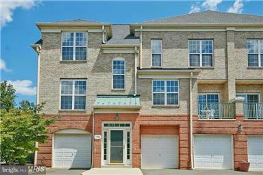 ** Original Owners ** Rarely seen St. Regis Model, End unit town-home with Pond View   Hardwood Floors Throughout   Gourmet kitchen includes Corian Counters and sink with breakfast bar. Located within the West Market Community, a stones-throw from Reston's Town Center and soon to be RTC Metro Station. Community has a beautifully renovated Clubhouse with a gym, party room and patio, pool and sauna.