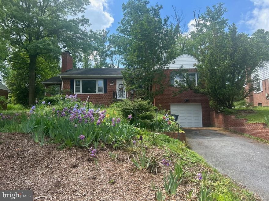 Take on this modern, urban bungalow. It features 3 bedrooms, 2 full bathrooms, ample living space and an abundance of sunlight through the large windows, not to mention the fully finished basement with a half bath and a separate shower stall. Recent updates include a new furnace (2019), updated electrical (2019), garbage disposal (2024) and garage door (2024).  Set on a nearly a third of an acre. The backyard features an established permaculture food forest with many edible perennials such as elderberries, serviceberry, mulberry, cherries, sun chokes, Kentucky coffee trees, blueberries, grape vines, currants, fig trees, as well many perennial herbs.  The established compost system will aid you in growing healthy, nutritious food season after season. Seller will consider some closing help to offset some minor repairs. Close to 495, 95, 295, and MD University.  Seller suggests Counselor Title.