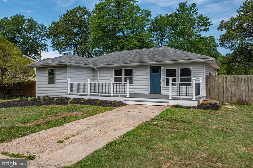 Fresh on the market, come see this absolutely beautiful home here in the Marley community!  On a huge lot, enjoy your front porch and friendly neighbors or take to the large fenced in back yard for family fun! With gorgeous finishes throughout, this updated rancher utilizes an open concept floorplan with continuous engineered hardwood throughout and a beautiful L shaped island open to both the living and dining rooms.   Revel in your renovated kitchen with all new slow-close shaker cabinets, quartz counters, modern backsplash and brand new stainless steel appliances including a smart tech refrigerator.  The main floor features 2 bedrooms and 2 bathrooms, highlighting a large master suite with walk in closet and a private bathroom with tile finishes.  Follow the custom built handrail with horizontal round bar down a fully finished basement  for additional living space!  The lower level includes wall to wall carpet, a full bathroom, and a bedroom with egress.   A wonderful opportunity to be in a lovely home with plenty of space, a great yard and close proximity to schools, malls, and dining!  With everything you need and more, schedule your showing today!