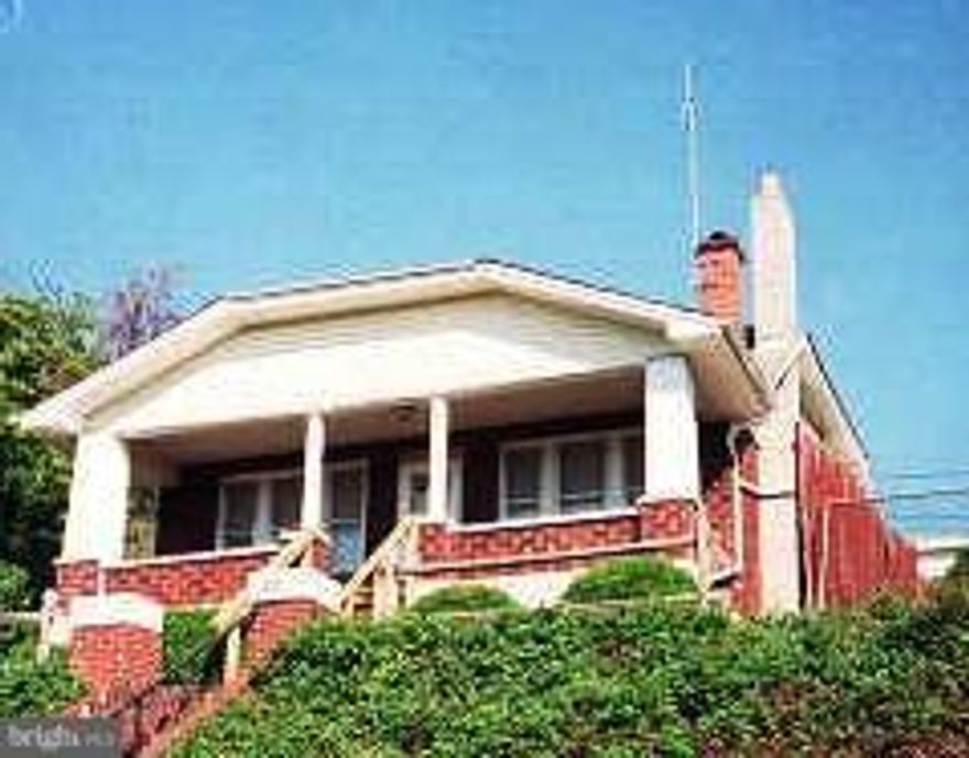 TONS OF POTENTIAL IN THIS CHARMING 3 BEDROOM 2 FULL BATH HOME WITH AWESOME VIEWS.  OFF STREET PARKING IN REAR.  SOME APPLIANCES.  WILL NEED MORE THAN A FEW GALLONS OF PAINT.  MORE PICTURES COMING.