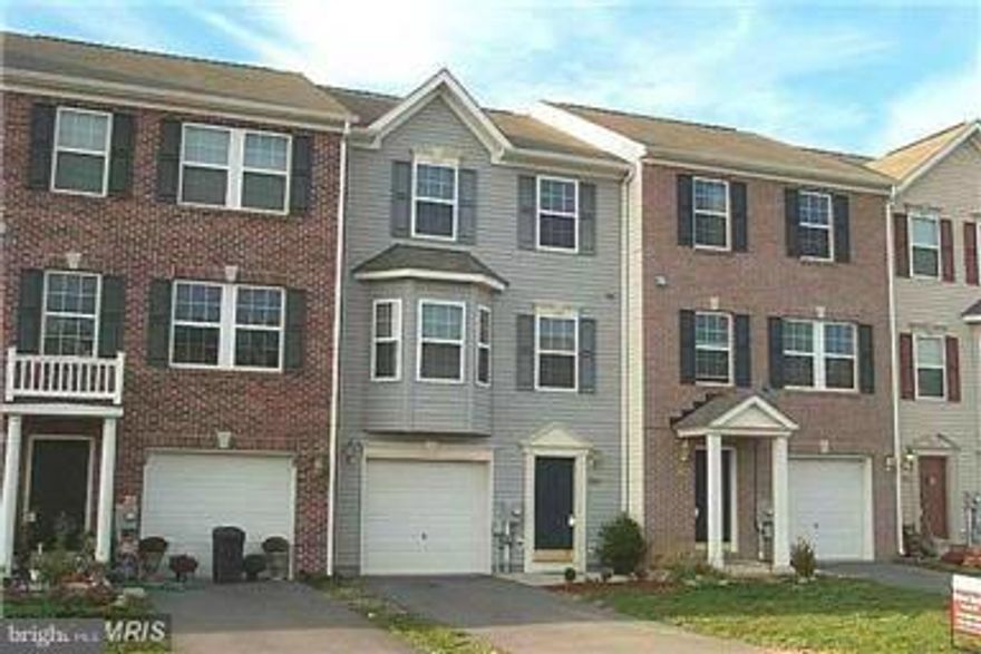 Beautiful upgraded townhouse in new condition. Bay window. New wood laminate floors in kitchen, living room  and dining room. Basement completed with bath and laundry room and ceramic floors. All rooms have new paint, flooring and lighting. Like new condition throughout the entire townhouse! One car garage with remote. Easy access to Rt 9 bypass and I81.