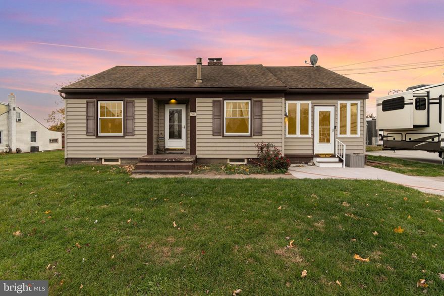 This exquisite ranch-style residence located in Conewago Valley School District offers a harmonious blend of comfort and elegance and NO HOA Fees. Set on a generous 0.44-acre corner lot, the property boasts a beautifully large front yard, inviting you to experience the warmth of home from the moment you arrive. The expansive rear yard offers a partially closed in vinyl fenced area known as the oasis that features a patio, 3 gazebos, one with a grill in, a fire ring, real palm trees, banana trees and a beautiful small fishpond that has beautiful stone around with a heart shaped rock. It's like being on vacation in this beautiful sanctuary. Then there is ample space for outdoor gatherings, gardening, or simply enjoying the tranquility of your surroundings in the remaining part of the backyard. The side yard goes 2 feet from the next residence on the right side of house so there is plenty of space. Built in 1940, this charming home has been meticulously maintained, showcasing excellent condition throughout. The interior features a seamless flow, highlighted by stunning hardwood and high-quality laminate plank flooring that exudes sophistication. The cozy living area is enhanced by a fireplace, perfect for creating a warm ambiance during the winter evenings. With three well-appointed bedrooms and a full bathroom, this residence offers both comfort and functionality for everyday living. The property's architectural style reflects a timeless ranch design, complemented by durable vinyl siding that ensures longevity and low maintenance. The poured concrete basement provides additional storage or potential for customization, allowing you to tailor the space to your lifestyle needs. Parking is a breeze with a detached garage that accommodates one vehicle, alongside a paved driveway offering space for three additional cars and off-street parking. The front door entry garage enhances the property's curb appeal while providing convenient access. More storage space in this 3 month old 12 x 20 shed and the 8 x12 shed made for all your lawn equipment or make a woman or man cave out of one of the sheds. Enjoy sitting on your rocking chairs on the room off of kitchen with a cup of coffee or your preferable drink and relax. This corner lot offers so much in New Oxford. Antique shops are so close by. Traveling to Rt 30 to go to York is easy. Rt 15 is so close by to go to Maryland or further north or south. Shopping is close by, restaurants, and medical facilities. Gettysburg Outlets are close by and so much more. Gettysburg Battlefield is close for all who love history. This location offers a perfect balance of privacy and accessibility, making it an ideal retreat while still being close to local amenities. This property is not just a house; it's a lifestyle. Embrace the opportunity to create lasting memories in a home that radiates warmth and charm. Whether you're entertaining friends in the spacious yard or enjoying quiet evenings by the fireplace, this residence invites you to experience the best of high-end living in a welcoming environment. Discover the perfect blend of luxury and comfort in this exceptional home, where every detail has been thoughtfully considered to enhance your living experience. Back inside the beautiful home you will find the washer and dryer on 1st floor but if you want to move it back to the basement there still are the washer & dryer connections. There is a laundry chute that is an added benefit. Furnace is 2017 and 2017 AC pump. Kitchen is full of beautiful cabinets, island, and 3 year old appliances. A cozy space for a dining room table. Furniture is negotiable for anyone to buy. Seller and husband are selling to be close to Grandchildren in another state. This one is not one to pass by. Call me for a private showing. More pictures to follow.