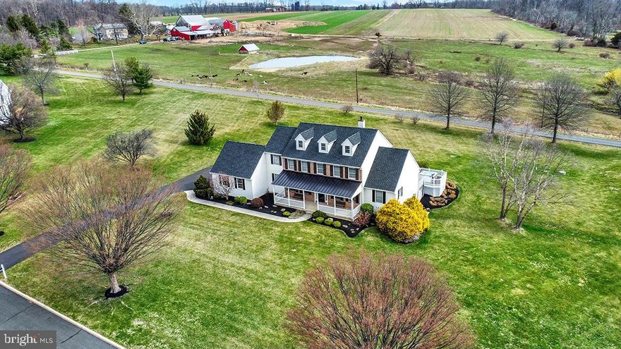 Exceptional, Kelly Builders Custom Built, Colonial Style home, situated on 2.02 acres within the Estates at Brookside, in the highly desirable Plumstead Township and the Blue-Ribbon Award-Winning Central Bucks School District. This home backs to a 100-acre farm that is designated as preserved open space, and there is plenty of elbow room between yourselves and your neighbors. The home has a generous, farm style, covered concrete front porch, with wood and wrought iron benches that remain. You are welcomed into the home through its classic colonial style foyer, with wainscoting and accent pillars that adorn the entries to formal dining room and the opposing formal living room, both with crown molding and dark stained hardwood flooring. The entry foyer leads you to an incredible two-story great room, with a wall of windows, that allows in all the natural light from the rear of the home. The decor is neutral and upbeat throughout, with bright white moldings, and built in cabinetry on either side of the gas fireplace, and a wall mounted flat screen tv, that will remain. The owner's suite is conveniently located on the main level, with the primary quarters spacious enough to handle even the largest suits of bedroom furniture, with double crown molding, ceiling fan, recessed lighting, and French doors leading to the rear deck and hot tub. The owner's en-suite bath was recently updated with tile flooring, double vanity with hard surface counter tops, makeup station, huge walk-in tiled shower, private water closet, and a very nicely sized his and hers walk-in closet.  This home's gourmet kitchen, which was also recently renovated, is absolutely magnificent, from the black, perimeter, hard surface counter tops, subway tile back splash, and under mounted farm style sink, to the contrasting center island cabinetry with hard surface 12" overhanging breakfast bar, commercial style icemaker, stainless steel Subzero refrigerator and freezer, double wall ovens, built in microwave, and surface mounted 6 burner gas cook top with professional style stainless steel range hood that vents to the outside, this kitchen is an absolute show stopper! There is a bright and open breakfast room, open to the rear of the kitchen, with French doors that lead to the oversized Trex deck and spacious rear yard, as well as the main level laundry area and mud room, that lead to the 2.5 car side entry garage with openers. The lower level is almost completely finished, with 1525 square feet of open recreation area, storage/utility room, wet bar, home gym, and home office with private entrance, perfect for the professional who may need to bring clients into the home after hours or on weekends. The second floor consists of three more nicely sized bedrooms, all with oversized closets, and are served by the family bath on the that level. There is also a full staircase, leading up to an unfinished 3rd floor attic, that could easily be finished into another bedroom or game room, well over 1000 square feet. The driveway, HVAC, Hot water heater, and roof were all recently replaced, making this home virtually maintenance free for many years to come, and also boasts a 10-circuit transfer switch for a portable home generator, a central sound system, and a central security system. Conveniently located just outside Doylestown Borough, all major conveniences are just minutes away, along with major routes leading to New Jersey, Philadelphia, and New York City. This home literally has it all and is like moving into a builder's model home. Don't wait to schedule your private tour, because this home simply will not last once it goes live on the open market!