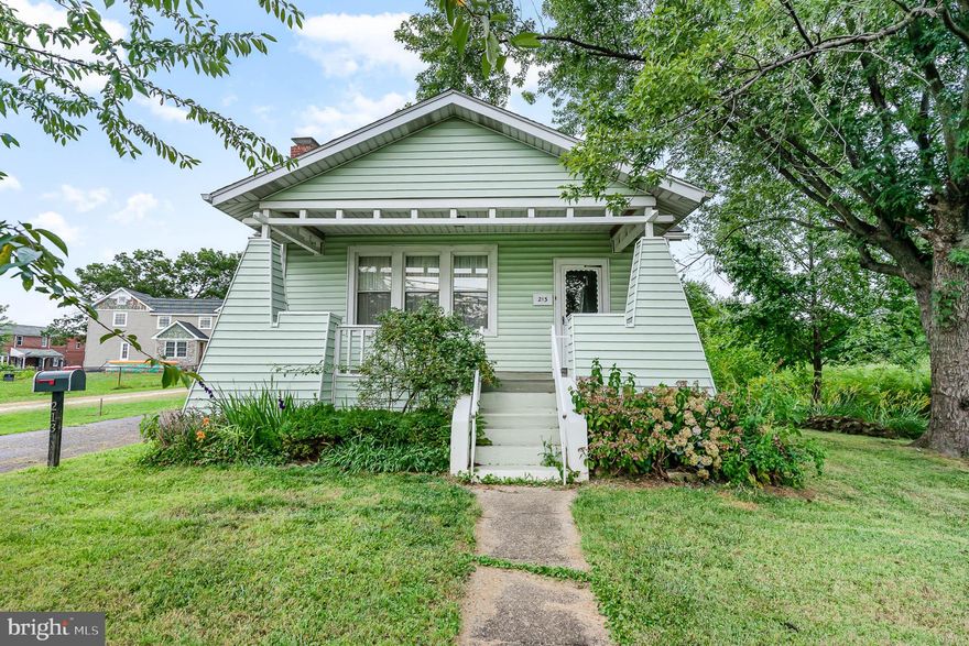 Welcome home! Single Family Home  at a Townhome Price. Well-maintained craftsman bungalow in good condition with updated kitchen and bath. Hardwood floors on main level. Full Unfinished Basement awaiting your finishing touch.  2-level deck with only a few steps to the back yard. Covered front porch to sit and relax at day's end. Large  private driveway with plenty of parking. Walking distance to local shops! Home is in good shape but seller prefers to sell home AS IS .  Hurry this home will not last long!!