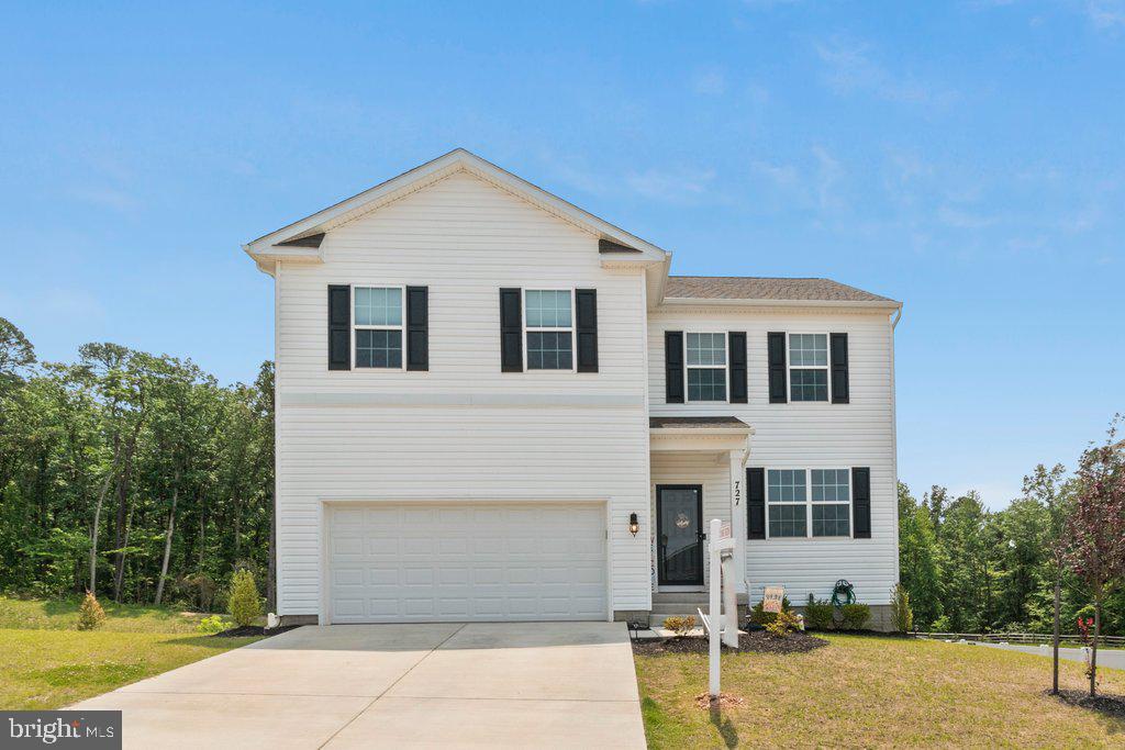 This 2 year old Galen has many upgrades the newer homes do not have. The home sits on a premium lot backing to trees. The total square footage is 3363. Walk into the entrance foyer and enjoy the entry accent walk with hooks for hanging coats. Across the hall is a bonus room for office or playroom. Continuing down the hallway there is a powder room. Entering the kitchen/dining room/family room combination is all about open space and entertaining! The kitchen has a breakfast island, generous cabinet space and a walk-in pantry. The Family Room has a Shiplap wall with a wood mantle and electric fireplace. Step out the slider to a new maintenance free 20x12 deck with steps to the backyard. The Trex floor has white railing with black spigots. The backyard is totally fenced with a 6 foot white vinyl fence for privacy. The basement has a Recreation Room with walkout access to the outside patio (20x12) with a fire pit circle (12 feet). Basement has plenty of storage area with a rough in for another bathroom. The community has a tot playground and other amenities when the community is complete. Easy access to I-95 and to Bel Air, Abingdon, and north or south Baltimore. Don't pass this home up!!!
