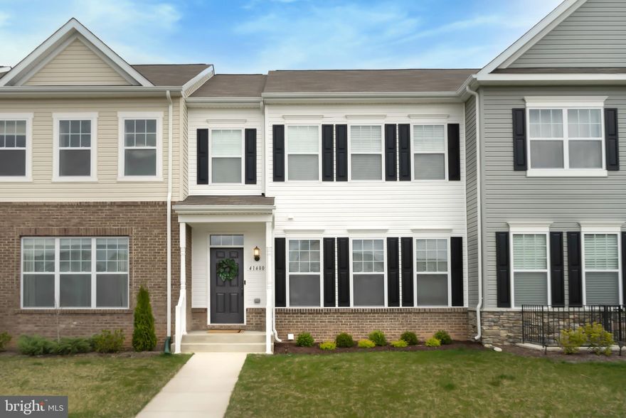 Beautiful 2021 Townhome situated in the desirable community of Clark's Rest in Leonardtown, Maryland.   This "newer" townhome boasts many upgrades!  Featuring a custom main level open floorplan with luxury vinyl plank throughout. Gourmet kitchen with upgraded cabinets, quartz countertops, stainless steel appliances, wall oven, built-in microwave, cooktop with custom deluxe range hood.  Kitchen features a breathtaking countertop-to-ceiling backsplash along main wall.  Off of the kitchen is a large deck overlooking a grassy area and woods with gorgeous sunset views over the community lake.  Stairs and upper level feature top-of-the-line Mohawk carpet and padding installed in August of 2021.  Two generous side-by-side bedrooms located on the front of the house and a Spacious Primary Bedroom located on the rear of the home with private, wooded view.  The Primary Bathroom features upgraded porcelain tile, dual sink vanity, soaking tub, and separate walk-in shower. The laundry room is conveniently located with the bedrooms on the upper level. Partially finished lower level features finished and painted drywall with a partially finished full bath.  There is a 2 Car Garage with a poured concrete driveway with enough parking for four vehicles.  Other features include a covered front porch overlooking the open green on Marwood Circle and community amenities such as clubhouse, pool, playground, sports courts, and maintained walking trails.  Walking distance to all that downtown Leonardtown has to offer... local dining, shops, waterfront wharf, library, etc.  A most convenient place to live!
