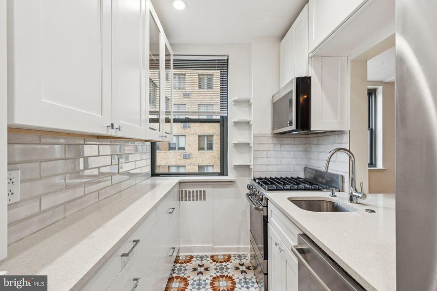 When it comes to choosing a condo in Philadelphia’s vibrant Art Museum/Fairmount neighborhood, you have plenty of options, sometimes under one roof—but this one makes the decision easy.
Introducing 2601 Pennsylvania Ave Unit #449: a delightful one-bedroom, one-bath corner condominium that perfectly blends modern design with everyday comfort. Bathed in natural light from its bright southern exposures, this residence feels open, airy, and inviting from the moment you step inside.

Every detail has been thoughtfully curated—from the sleek tilework and custom cabinetry to the stylish countertops and updated fixtures—creating a space that feels both sophisticated and welcoming. Whether you’re looking for your very first home, a smart investment property, or a charming pied-à-terre in the city, this condo checks every box.

Situated directly across from the Philadelphia Museum of Art and Fairmount Park, the building offers the ideal balance of culture, recreation, and convenience. You’re just moments from Kelly Drive, Boat House Row, the Barnes Foundation, Whole Foods, and a dynamic array of restaurants, cafés, and boutique shops. The building is pet-friendly and provides easy access to public transportation, making city living effortless and enjoyable.

Discover why this beautifully renovated home stands out among the rest—Unit #449 is where comfort, style, and location come together in perfect harmony.

Buyers are responsible for verifying taxes and square footage, condo association and capital contribution fees.