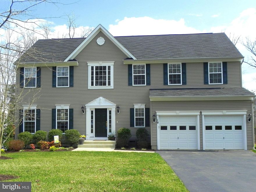 Move In Ready!  Beautiful Colonial in Pristine Condition with all the Upgrades!  9 Ft Ceilings on Main Lvl, Crown/Box Moldings, Recessed Lights, Maple Cabinetry, Granite Countertops w/Tile, S/S Appliances. Huge Master Suite w/Luxury Bath, 2 Walk in Closets. Finished Basement w/Rec Rm, Den/Office, 5th BR & Bath Ready to Finish! Deck &  Irrigation System!