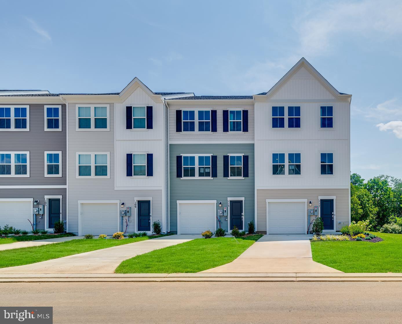 ESTIMATED DELIVERY: EARLY SUMMER 2025!
Welcome to The Gallery, one of Martinsburg's newest communities! Located centrally to plenty of recreation, dining, and shopping options, and only 2 miles proximity to major metros like I-81, you'll have everything you need within minutes of your brand-new home!
Introducing the Harriett floor plan by Lennar, where luxury meets affordability. This 3-level townhome boasts a front-load 1-car garage, a spacious backyard, and 3 bedrooms. With 2 full baths and 1 half bath and an alternate third floor plan with a 2-foot extension, you'll have all the space and conveniences you desire. When you step into the home from the 1-car garage you will see the spacious rec room waiting to be transformed to meet your needs. Once on the second level, you'll see the kitchen features beautiful White Ornamental granite countertops, Barnett Duraform cabinets in Linen, and Frigidaire stainless steel appliances. This level has a half bath and an open concept connecting the dining room and great room, plus extra LED lights. Upstairs, you will find all 3 bedrooms and 2 full bathrooms. The primary suite includes a walk-in closet. The laundry room is upstairs for added convenience. Don't miss your chance to be one of the first homeowners in this up-and-coming community!
*Prices and incentives are subject to change without notice. Photos are of a similar home. Prices and features may vary and are subject to change. Prices do not include closing costs and other fees to be paid by buyer and are subject to change without notice. This is not an offer in states where prior registration is required. Void where prohibited by law. Copyright © 2022 Lennar Corporation. Lennar, the Lennar logo are U. S. registered service marks or service marks of Lennar Corporation and/or its subsidiaries. Date 02/22