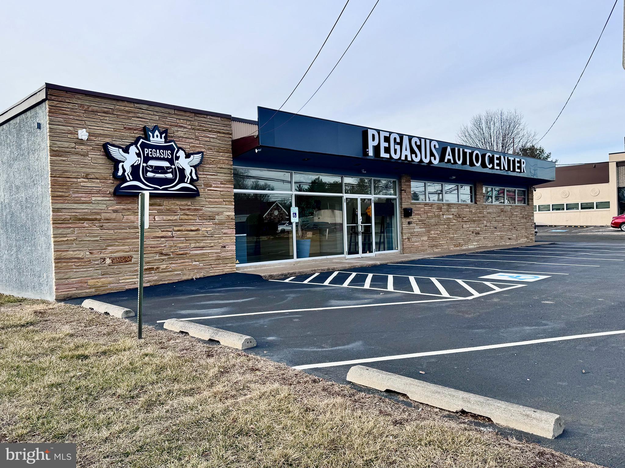 Prime Location , High Traffic, High Density Area. Multiple Possible Uses Under This Commercial Zoning - currently set as Auto Dealership’s Sales /Showroom. Building was completely renovated in 2024 including Newer roof; 3 new heat zones ; New Bathrooms ; New floors : New windows
New asphalt;New electric and lighting Updated plumbing
Featuring Spacious Reception Area, One Full Bathroom and One Powder Room; Kitchen; Two Workshops with Three Car/Loading Doors (with Two New Openers) - One Lift and one Tire Mounting Machine Included (as Well as Snap On Air Compressor and Generator). State-of-the-art Security System with Multiple Exterior and Interior Cameras; 2 Electric Meters; 10 Parking Spaces in the Front of the Building, and About 20 Should Fit Inside Fenced Rear Yard/Lot.