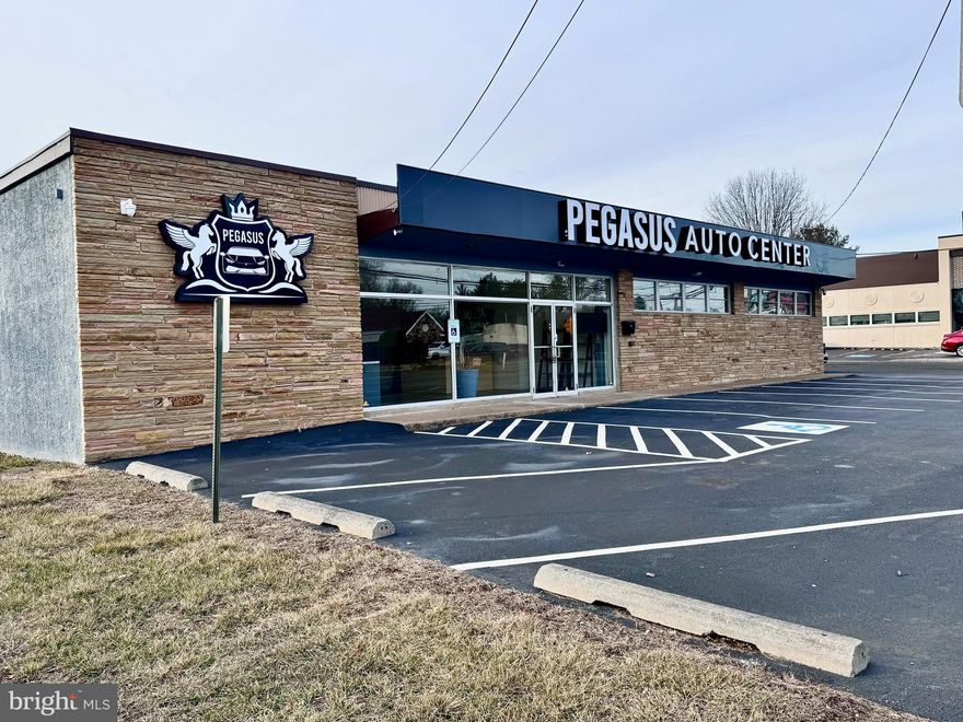 Prime Location ,  High Traffic, High Density Area. Multiple Possible Uses Under This Commercial Zoning - currently set as  Auto Dealership’s Sales /Showroom. Building was completely renovated in 2024 including Newer roof; 3 new heat zones ; New Bathrooms ; New floors : New windows
New asphalt;New electric and lighting Updated plumbing 
Featuring Spacious Reception Area, One Full Bathroom and One Powder Room; Kitchen; Two Workshops with Three Car/Loading Doors (with Two New Openers) - One Lift and one Tire Mounting Machine Included (as Well as Snap On Air Compressor and Generator). State-of-the-art Security System with Multiple Exterior and Interior Cameras; 2 Electric Meters; 10 Parking Spaces in the Front of the Building, and About 20 Should Fit Inside Fenced Rear Yard/Lot.