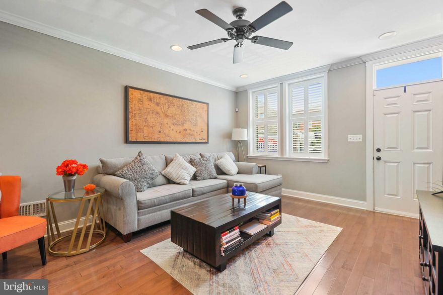 Gorgeous fully renovated 3 bedroom, 3 full bath home in Federal Hill! Entry level boasts hardwood floors, exposed brick, crown moulding, and recessed lighting. Gourmet kitchen with white shaker cabinets, kitchen island with pendant lighting and stainless steel appliances. Primary bedroom with en suite bath with stand up shower with shower heads, double vanity and two closets. Second bedroom, hall bath and access to a huge roof top deck on upper level. The basement has been fully finished with third bedroom/rec room, full bath and laundry. This MK built home is a must see!