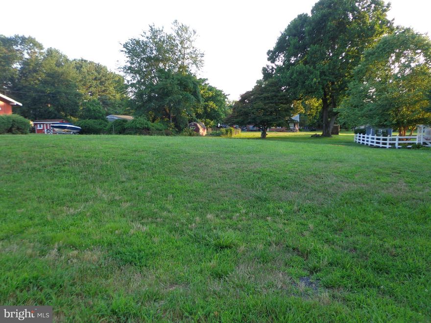 Perc approved and ready to build.....1 block to the beach, pavilion,basketball and volley ball court....This community gives Staycation a whole new meaning. Walk to Turkey Point Light House, bring your boat and enjoy! The community offers 2 docks and a boat ramp and a community spirit matching no other.... close to I-95 commuter corridor