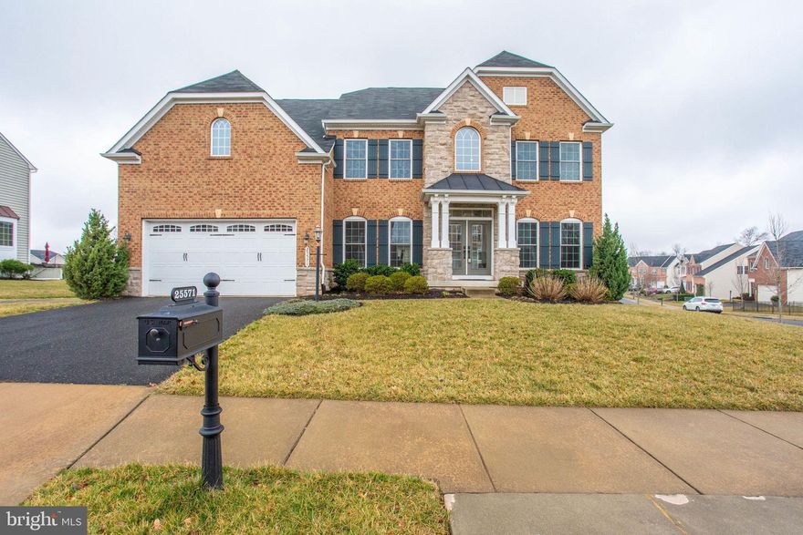 This Move-in ready home in the desirable Seven Hills community of Aldie has an attractive brick and stone front and sits on .25 acres. With nearly 6000 square feet on three finished levels, there is lots of space for family gatherings and entertaining! This amazing house offers 5 bedrooms, 4 full and 1 half bath, a main level study and a 2 car oversized garage. The two-story foyer opens into the living room and dining room, then on to the inviting kitchen and great room that lets you entertain with ease. Dining room features a tray ceiling and crown molding here and throughout the main level. Beautiful hardwood flooring flows throughout the main level rooms and continues up the dual staircase to the bedroom level hallway. The bright and inviting great room beckons with a wall of Palladian windows, a cozy fireplace and adjoins the stunning kitchen with stainless steel appliances, expansive granite counters and extra space for dining. The convenient butlers pantry will help organize and store your special serving pieces, while the morning room is the perfect place to start or end your day sharing a meal and overlooking the large backyard.Upstairs is light and bright! Owners suite features two large walk in closets with custom built-ins, tray ceiling with LED lighting, inviting sitting room with outdoor balcony and luxurious, updated private bath. This oasis features a soaking tub, oversized shower w/ dual heads, separate sinks with granite vanity tops and more!Three additional large secondary bedrooms - one has a private bath and walk-in closet and the others have access to the spacious hall bath, are located on the upper level. The lower level was recently finished with a stunning wet bar/kitchenette with stylish stone accents, full-size refrigerator, microwave, pretty granite counters and upgraded cabinets with soft close doors and pull out shelving. Enjoy a large family room with space for multiple activities and numerous large windows to let in loads of natural light and walk out access to the backyard. Guests will appreciate the (legal) 5th bedroom and nearby full bath. An additional finished space with French doors makes a perfect craft room or workout room and there is plenty of finished and unfinished storage space.This home is better than new and can be yours before summer so you can enjoy the lovely neighborhood amenities. Don t miss it!