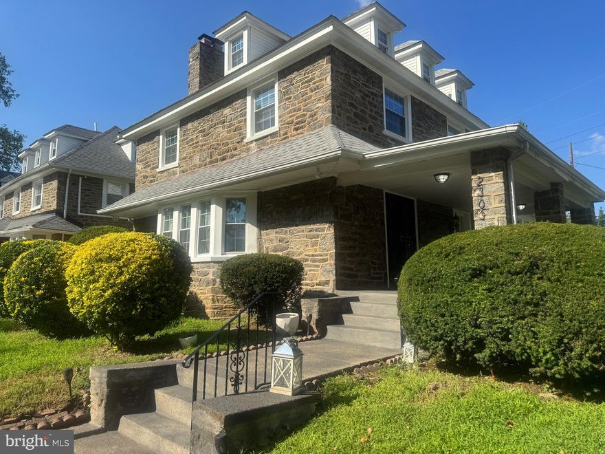 Welcome to this beautifully maintained home.  This exceptional 5+ bedroom, 4-full-bathroom residence in the city offers the space and tranquility of a suburban home.
Upon entering, you are greeted by gleaming hardwood floors that flow throughout the entire home except the finished basement. The floor plan features a distinct living room with a wood burning fireplace that offers a dedicated space for formal entertaining or quiet relaxation.  The spacious dining room flows in to the kitchen, creating an ideal open-concept space. The kitchen is equipped with stainless steel appliances, plenty of cabinets and granite counters. A dedicated prep sink in the kitchen island complements the main sink. Ascend to the second level to discover the living quarters. The expansive primary suite is a true retreat with two walk in closets,  ample room for a king-sized bed and a sitting area. The primary bathroom has a deep tub/shower and a spacious double vanity which provides ample personal space. Also on this level are two additional well-proportioned bedrooms, a shared full hallway bathroom, and the ultimate convenience of a dedicated laundry area, no more carrying baskets up and down stairs.
The third floor offers two more spacious bedrooms and another full bathroom. This level is perfect for a guest suite, or a multi-room home office setup.
The value continues in the fully finished lower level, which expands your living and entertaining options. This versatile space has a built in bar and a family room area. Two additional private rooms offer limitless possibilities-transform them into dedicated home offices, a personal gym, guest quarters, or hobby rooms. A fourth full bathroom on this level adds incredible functionality and creates clear potential for an in-law suite.
Perhaps the most unique feature is the separate, detached structure. Imagine this as a tranquil zen room, this climate-controlled space is a blank canvas. Convert it into a state-of-the-art home gym, a private art or music studio, a spectacular playroom, or an executive office.
Close proximity to public transportation and  shopping venues. Just minutes away from the Bala Golf Club. Schedule your private tour today to experience this beautiful home for yourself.