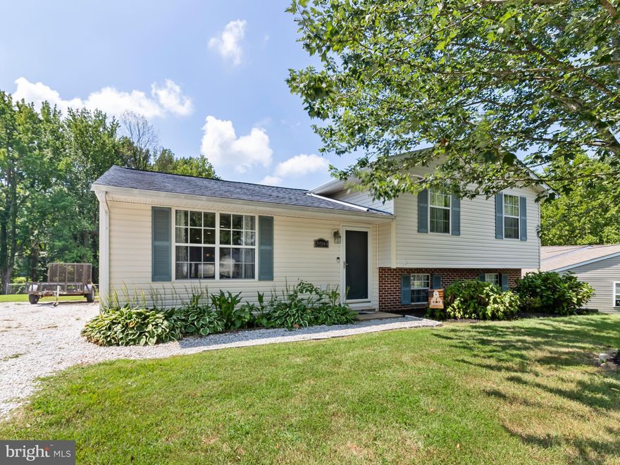 Discover this charming 3-bedroom, 2-bath split-level home in the Corbin Parkway community. Well maintained by one owner, this home offers key updates including a new gas furnace (2024), hot water heater (2023), newer HVAC system (2020), and roof (2017). Brand-new slider doors (2024) lead to a backyard that backs to mature trees, offering privacy within a neighborhood setting. The inviting layout features a spacious, updated kitchen with ample table space and a light-filled living area. The partially finished basement provides added versatility for a home office, gym, or playroom. Perfectly located near parks, schools, and local amenities, this home is a must-see.