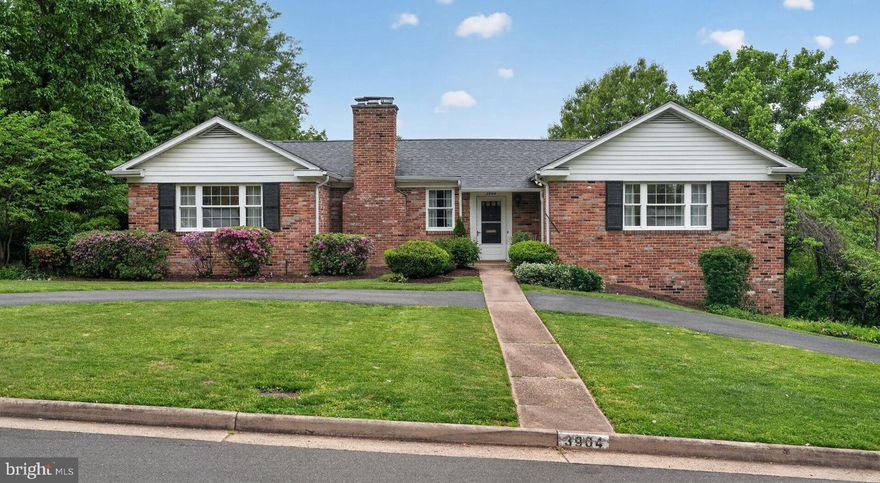 Welcome home to 3904 Ridge Road, a stunningly landscaped rancher in Annandale that perfectly blends curb appeal with effortless living. The journey begins with a sweeping half-circle driveway providing a convenient level entry into the home's bright and inviting layout. The main level offers a newly renovated eat-in kitchen and a formal dining room situated right next to a light-filled sunroom, while the spacious living room, anchored by a cozy fireplace, serves as a natural divide between the private quarters. One bedroom enjoys its own private en-suite bathroom, while two additional bedrooms and a full hall bath are located on the opposite side of the living area. The living space extends to a versatile walk-out basement, which features a large family room, a fourth bedroom, a full bathroom, a dedicated laundry area, and a flexible bonus room perfect for an office or gym. This lower level provides direct access to the garage and opens onto a gorgeous patio overlooking the meticulously manicured yard and two functional storage sheds, creating a true outdoor oasis designed for both relaxation and entertaining.