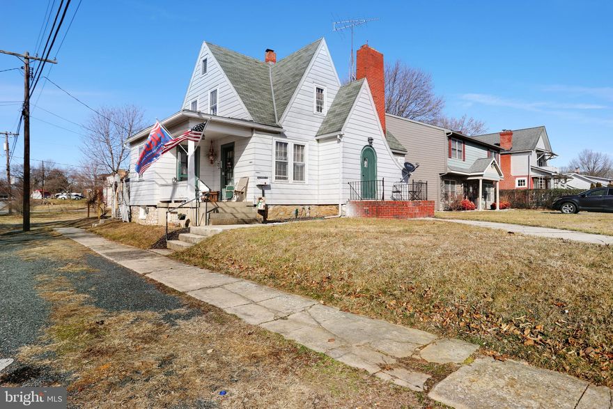 Beautifully  renovated home with tons of charm and beauty! Living Room features a large brick wood-burning fireplace and beautifully refinished hardwood flooring.  The large upgraded kitchen has a spacious center island, new cabinets, a walk in pantry, built in storage and work desk. You have access to a main level bedroom along with a half bath and a main level laundry room.  The upper floor has 3 bedrooms and a full bath and a floored attic for plenty of storage. The basement is unfinished for you to make your own.  The garage has added space above with a loft.  Relax out back by the fire pit and enjoy your beautiful setting! So much potential!