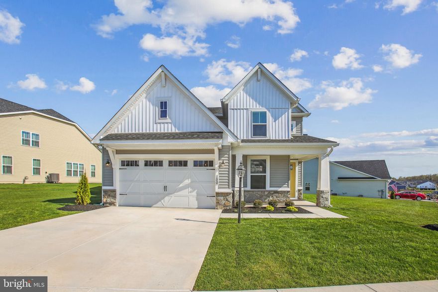 Up to $15,000 toward Closing Costs!  Located in the premier active adult community of Amblebrook Gettysburg, the 2-story Hayes model offers the convenience of main-level living along with a second floor, perfect for entertaining grandkids, hosting guests, or expanding your living space. Amblebrook offers stylish homes in a vibrant 55+ community. Enjoy nature, farm-to-table dining, fitness, wellness services, and endless social activities. Just minutes from historic Gettysburg, Amblebrook blends tranquility with convenience—inviting you to live fully, stay active, and embrace every day in a thoughtfully designed setting. When you're ready to escape to your private haven, step inside this beautifully designed 4-bedroom, 3.5 bath home with 3,000 square feet of low-maintenance living. Thoughtfully crafted with the active adult in mind, this home features a spacious open-concept layout, a luxurious main-level primary suite, and a second floor ideal for guests or hobbies. Energy-efficient features like advanced insulation, a smart thermostat, and high-performance windows help you stay comfortable year-round while keeping utility costs down. Appointed with upscale finishes and thoughtful upgrades throughout, such as: * 9' Ceilings on both levels * Gourmet Kitchen with stainless steel appliances, quartz countertops, and designer cabinets * Gas fireplace in Family Room * Sunroom addition * 1st Floor Primary Suite with 4' extension and luxury bath with walk-in shower and freestanding tub * Walk-in closets * 2nd floor with loft, two bedrooms, and full bath with custom soaking tub * Tray ceilings in Foyer & Primary Suite * 2" Faux Wood Blinds throughout * Craftsman-style trim package * 2-Car garage with fully insulated walls and ceiling * Premium home site with large side yard. Many more grand features await you in this Hayes floorplan! Some photos have been virtually staged to better showcase the true potential of rooms and spaces in the home. See New Home Sales Consultant for a complete list of included features.