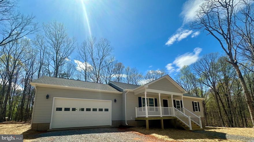 Beautiful new construction home on 3 acres of land-great location. Completion expected by April 15th. Home features 3 BR/2BA with attached two car garage. This home is minutes from Rt. 29 and has lots of upgrades! Kitchen boasts granite countertops and stainless steel appliances. LVP flooring throughout main level. Primary bedroom with on-suite bath. Both full baths also feature granite countertops. The full un-finished, walk-out basement has rough-in plumbing for 3rd full bath and offers opportunity for future expansion to potentially double your living space. spacious deck is included in sale price. This property has no covenants or restrictions and has a private entrance off of hard-top road.