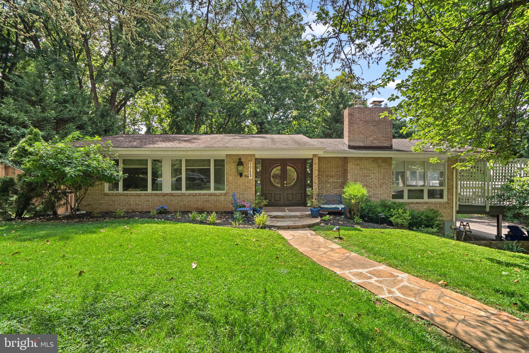Tucked away on a quiet cul-de-sac in Bethesda’s coveted Burning Tree Estates, this gorgeous home is a peaceful, park-like retreat offering comfort, style, and connection to one of the area's most desirable neighborhoods—just minutes from premier country clubs and top-rated schools.*
This bright, freshly painted, beautifully updated 4-bedroom, 3-bath residence blends classic charm with thoughtful, modern updates across a layout that feels both spacious and cozy—perfect for everyday living and memorable gatherings alike.*
Step inside and feel instantly at home among gleaming hardwood floors, custom built-ins, and a sunlit family and dining area framed by stunning floor-to-ceiling windows that bring the outdoors in.*
From here, step out onto the expansive deck—an entertainer’s dream and the perfect place to enjoy quiet morning coffee, evening dinners, or weekend get-togethers under the trees.*
At the heart of the home, you’ll find a warm and welcoming kitchen with stainless steel appliances, granite countertops, and cabinetry that will soon be freshly repainted for a crisp, clean finish.*
The primary suite is your personal retreat: spacious, tucked away for privacy, and offering not one, but two walk-in closets.* The spa-like main level bath features a soaking tub, walk-in shower, and dramatic skylights that fill the space with calming natural light.*
Each additional bedroom is generously sized, with room to grow, work, or simply rest in total comfort.*
Downstairs, the fully finished walk-out lower level offers even more flexibility—with a large recreation area, countertops and cabinetry, a full bath, and the fourth bedroom—ideal for guests, in-laws, and an additional room perfect for a work-from-home setup.*
Other highlights include a rare 3-car carport, fresh paint planned throughout the home, and lush, landscaped grounds that offer beauty and privacy in equal measure.*
All of this is just moments from downtown Bethesda, with easy access to beloved parks, restaurants, top-tier schools, and commuter routes—bringing everything you need within reach while giving you the peaceful lifestyle you deserve.*