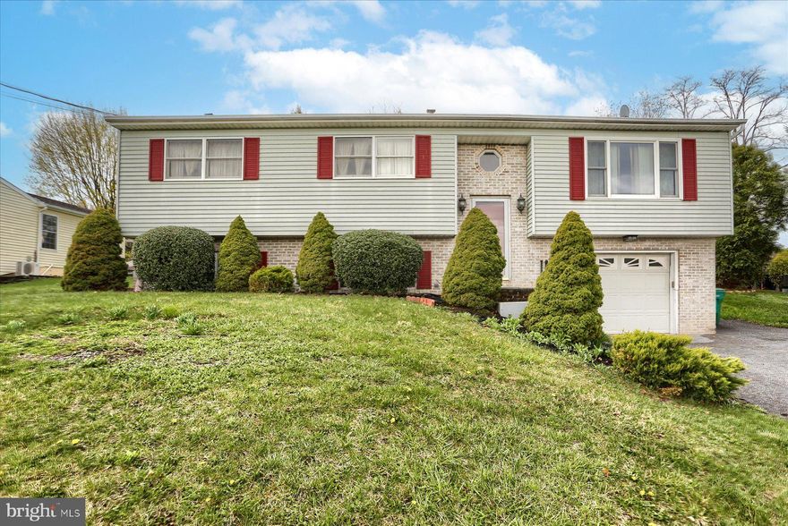 How nice to be so close to everything. Come home at the end of the day and relax on your rear deck, entertain and grill. On those cold days enjoy the pellet stove in the Family Room. No more clearing off ice and snow when you park in your garage! Nice chain link fence whatever the need! The appliances stay as do the window coverings. The rear shed can house your gardening or mowing equipment. The washer and dryer are about 4 years old, cold water tank about 1 year old. The kitchen has bee remodeled and you can enjoy the extra granite counter space and cabinet space that was added. The seller has enjoyed many years in this home and has decided to move to warmer weather! Do not miss the opportunity to see this property!