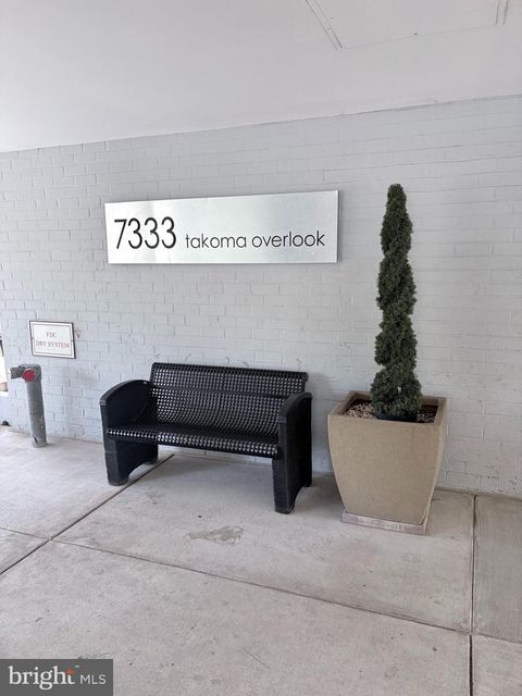 Photo of 7333 New Hampshire Avenue #416 S, TAKOMA PARK, MD 20912 (MLS # MDMC2239106)