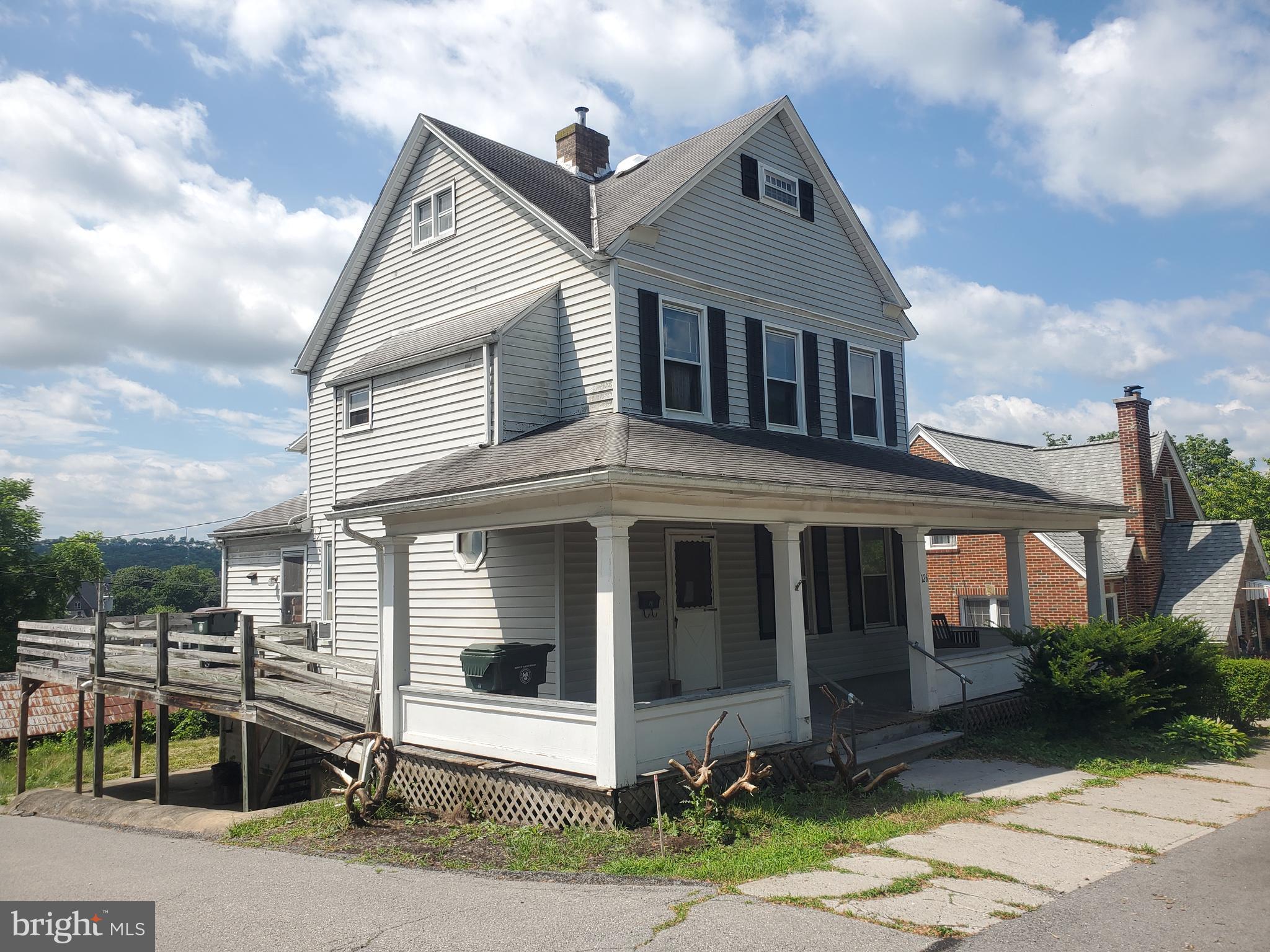 This home will need some repairs however it is in sought after residential neighborhood. All rooms are of ample size and a separate small apartment in the basement with a separate entrance. The additional rent from the apartment would help with maintenance costs etc. This property has off street parking on a corner lot that has a slightly sloping back yard. Please call Listing Office for key information.