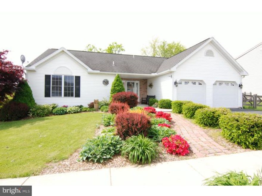 DROP DEAD GORGEOUS!  That's the only way to describe this 3-4 bedroom, 3 bath home with beautifully landscaped and fenced in rear yard, which opens to playground. Step inside and you will immediately be impressed with the openness this absolutely amazing home has to offer. The very bright and spacious great room boasts with tons of natural light with skylites,extra windows and sliding doors which lead to the oversized deck. There is a 25 handle kitchen with stainless stove and microwave. Large window added above sink, as well as the dining area, to enjoy more natural light.  The nice size master bedroom suite has a large walk-in closet with built in shelving and of course it's own full bath. 2 more bedrooms, another full bath and laundry area complete the 1st floor in this fabulous home. In the lower level you will find a HUGE finished area which can be used as a family or workout room, or anything else you would like, and includes a kitchenette/wet bar, great for entertaining.  There is an additional full bath and a bedroom/office area, perfect for overnight guests. There are no vinyl floors in this home and there is crown molding throughout the first floor. Oh and did I mention the water heater, dishwasher and microwave are only a year old and there is already a radon system installed!  You won't want to miss out on this truly spectacular property!